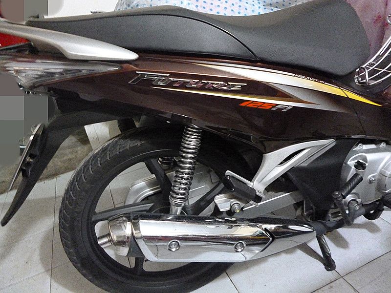 HONDA: FUTURE 125Fi. Đời cuối 2012, thắng đĩa bánh mâm, màu vàng nâu - 1