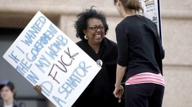 OK-state-senator-holds-sign.jpg